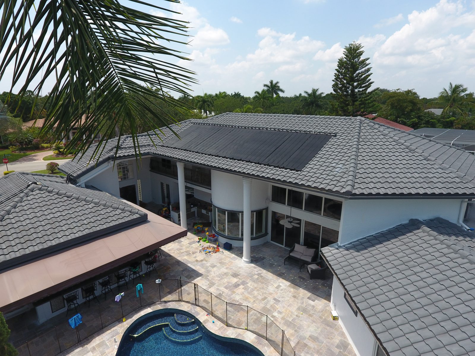 Picture of a pool solar heater mounted on a residential roof